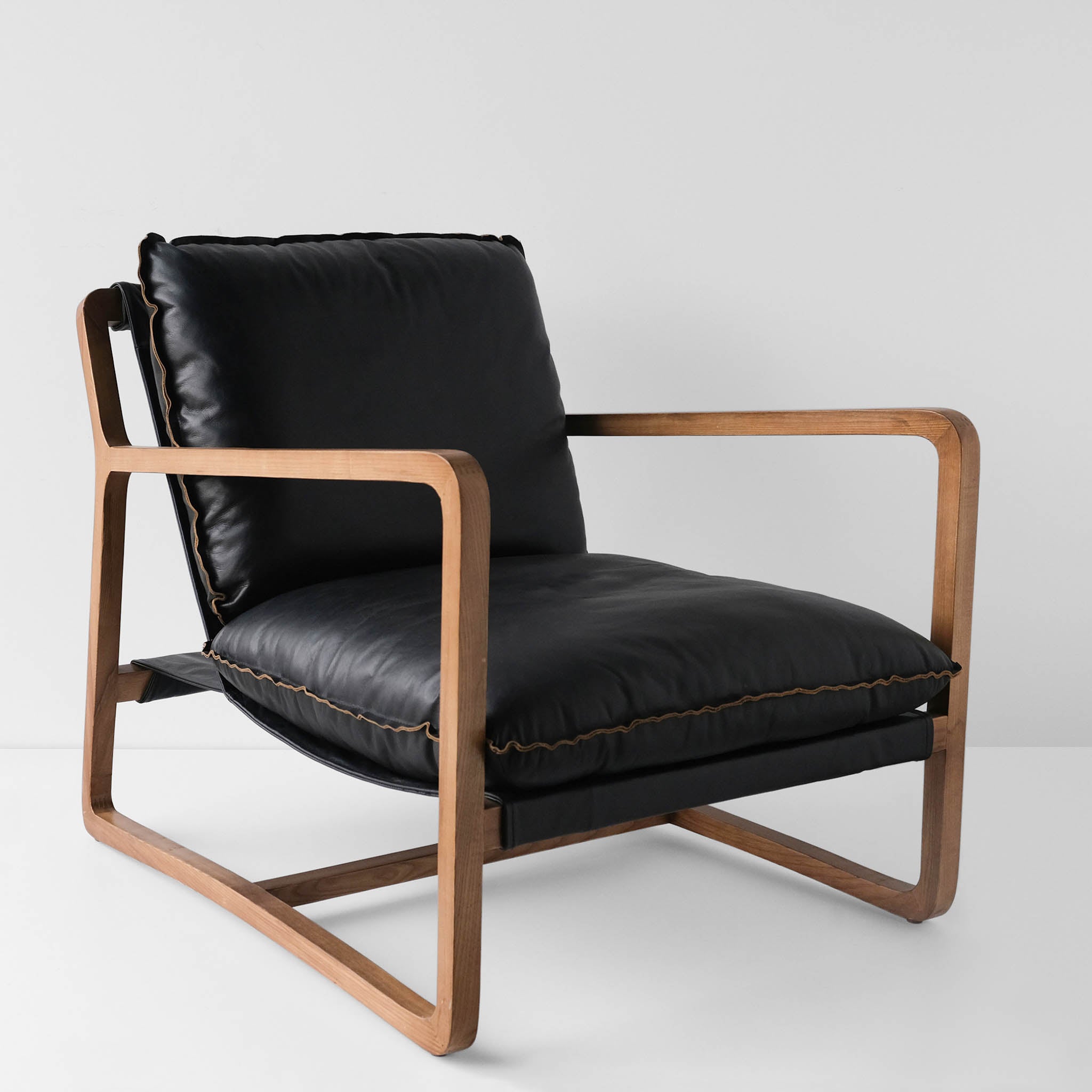 Black leather and discount wood accent chair