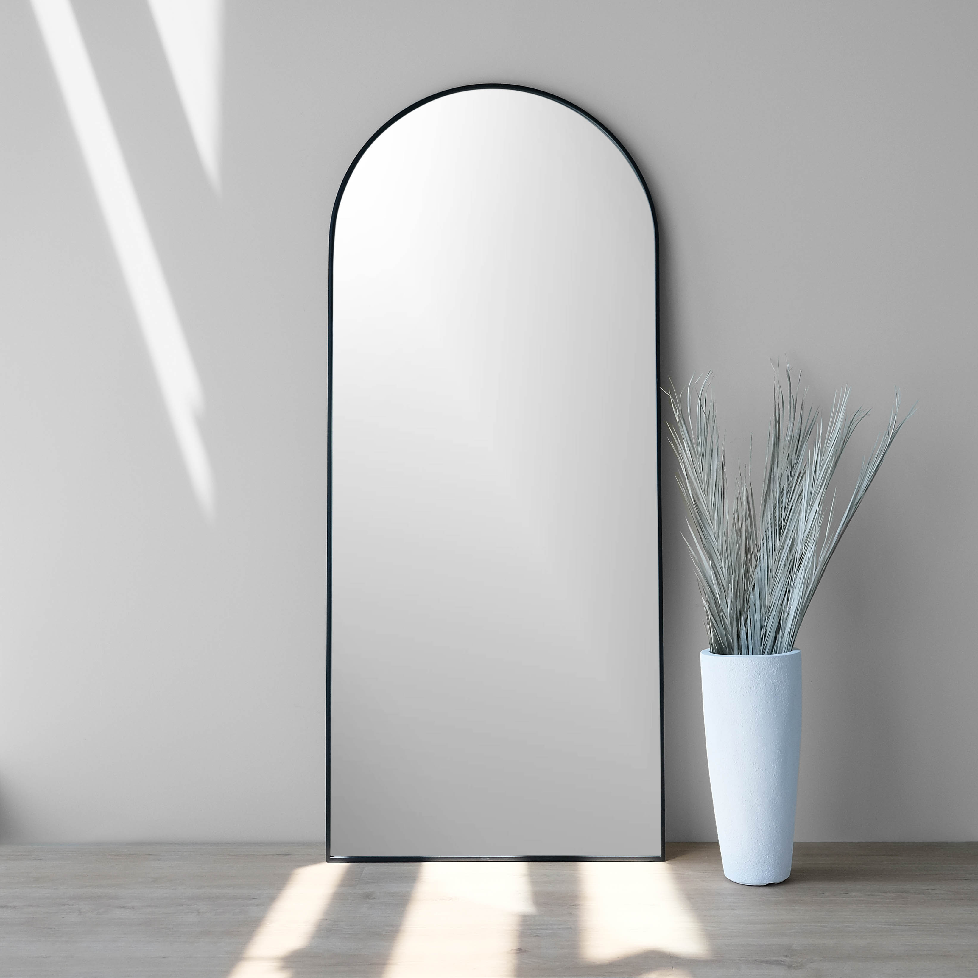 30x70-inch black iron framed arch mirror