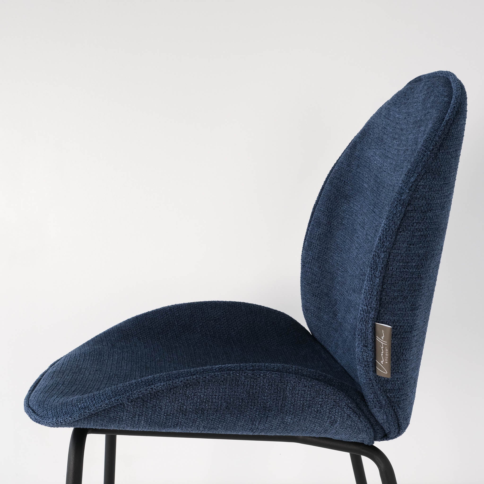 Seat view of a royal blue Beetle dining chair