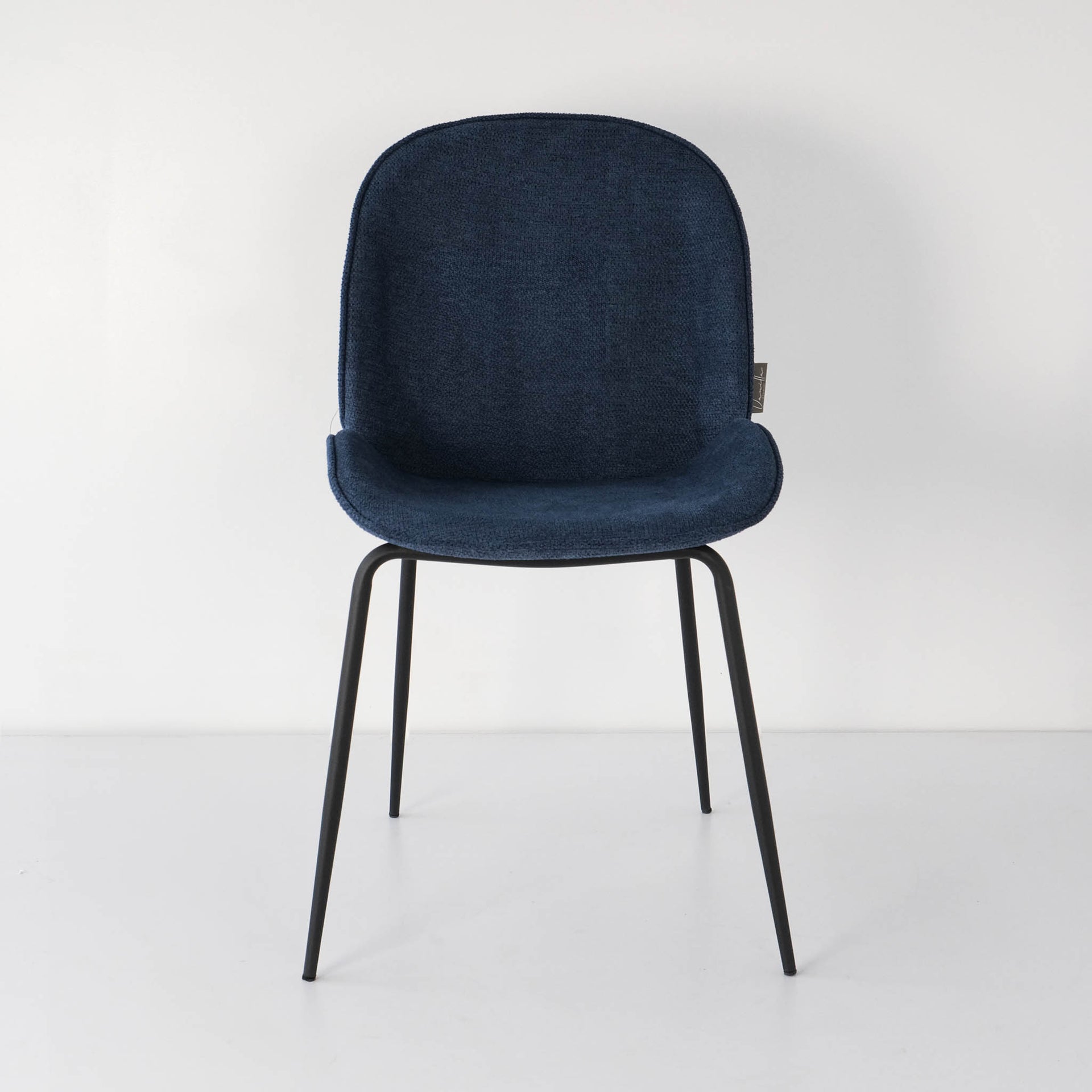 Front view of a royal blue bettle chair