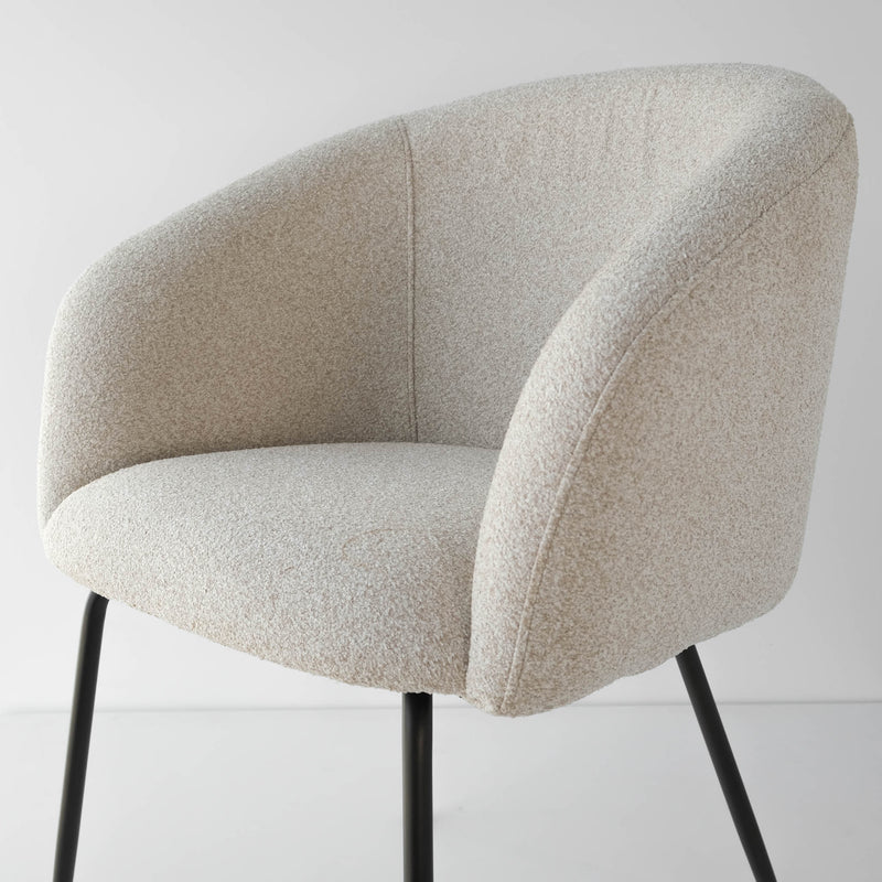 Comfort curvature of seat shown of the oatmeal dining chair
