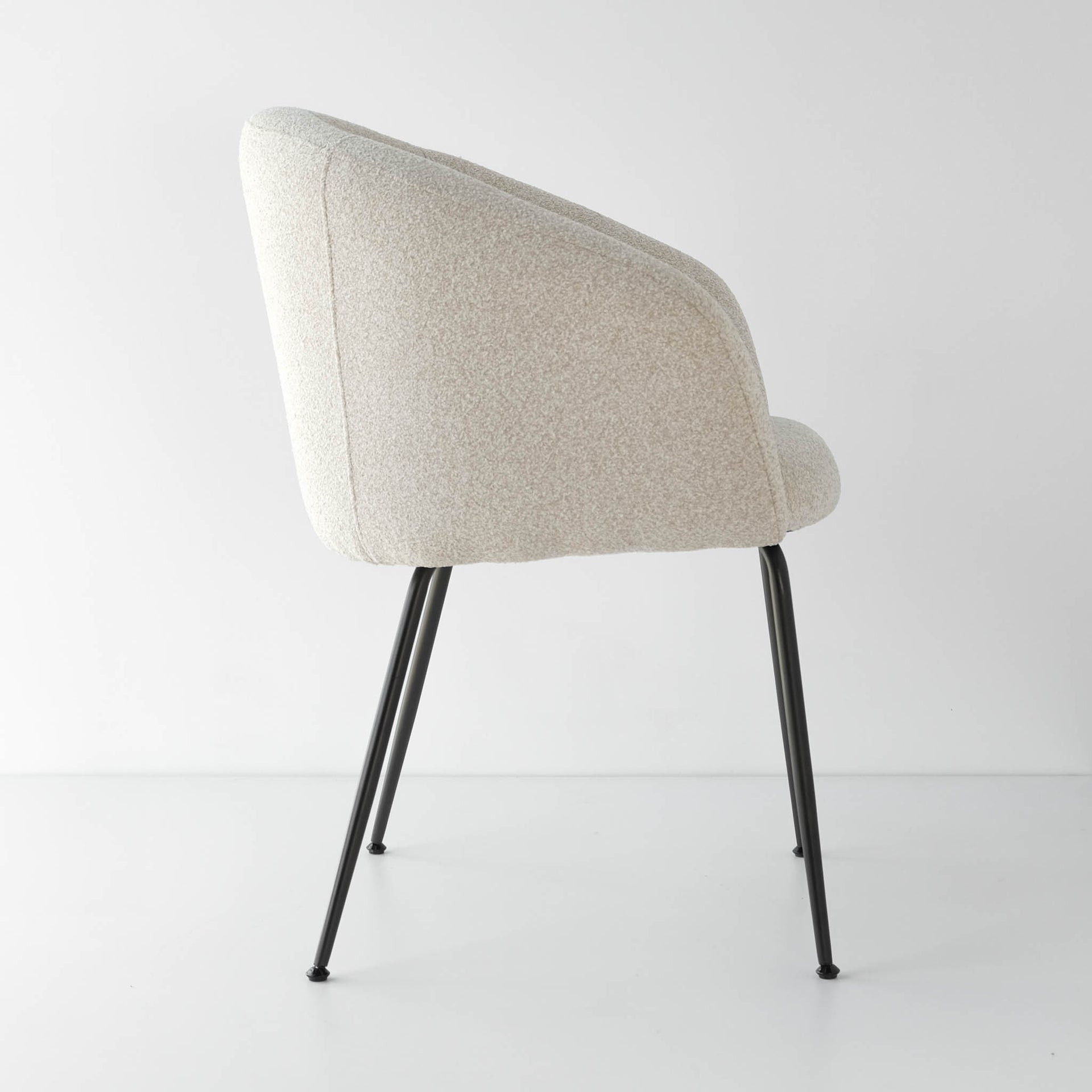 Sleek and stylish, a oatmeal dining chair perfect for contemporary spaces