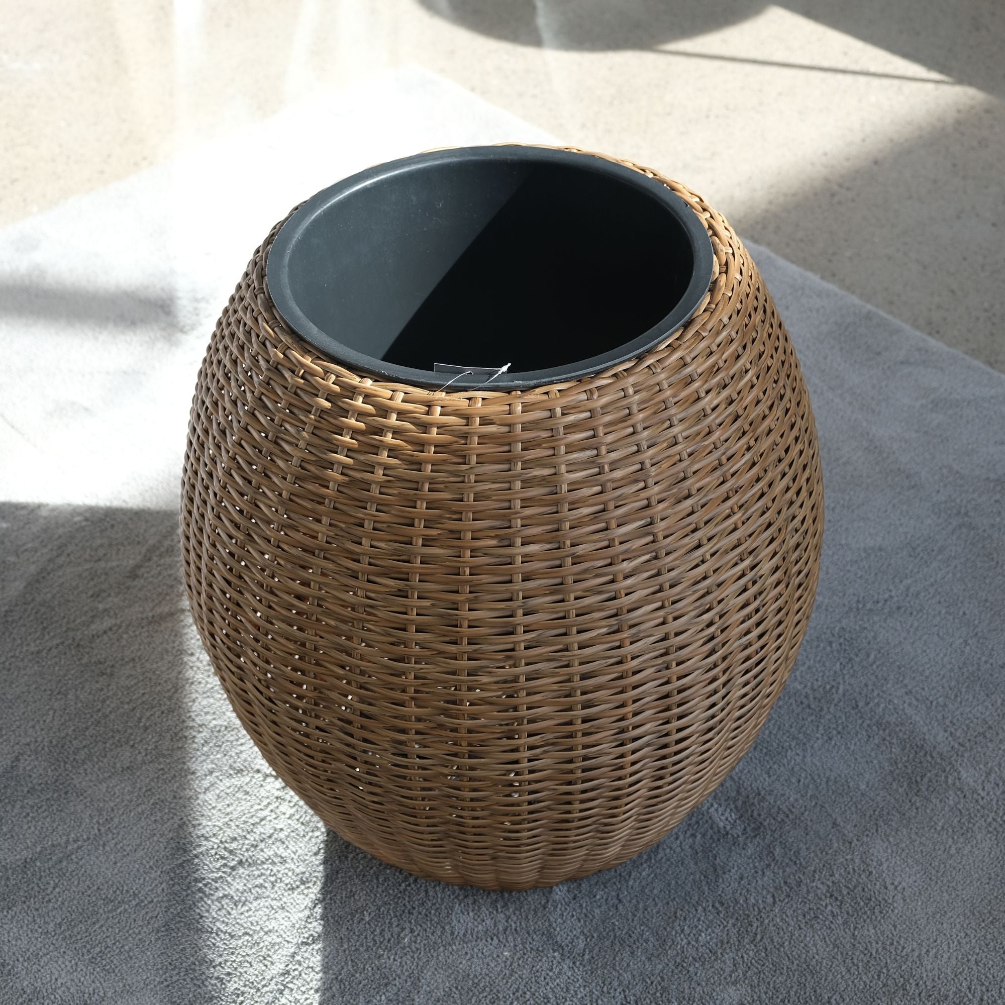 top view of rattan planter with inner pot