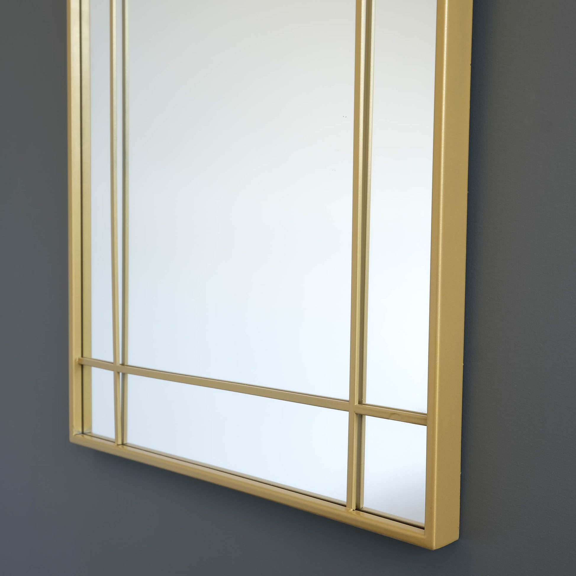 side view of gold wall mirror