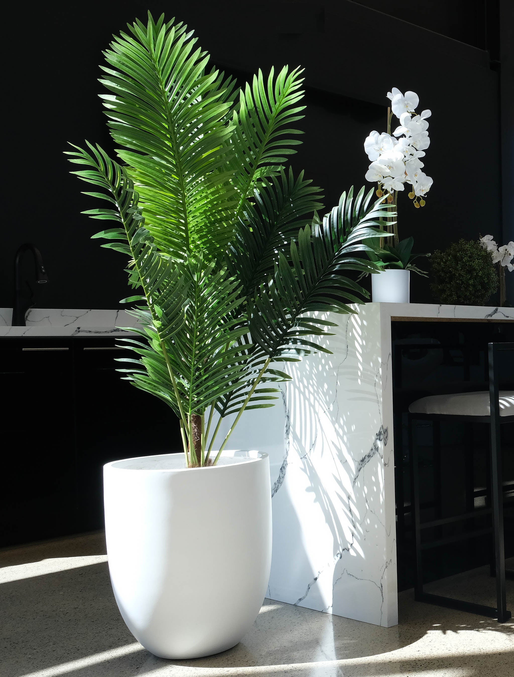 White Salma planter with faux-palm tree
