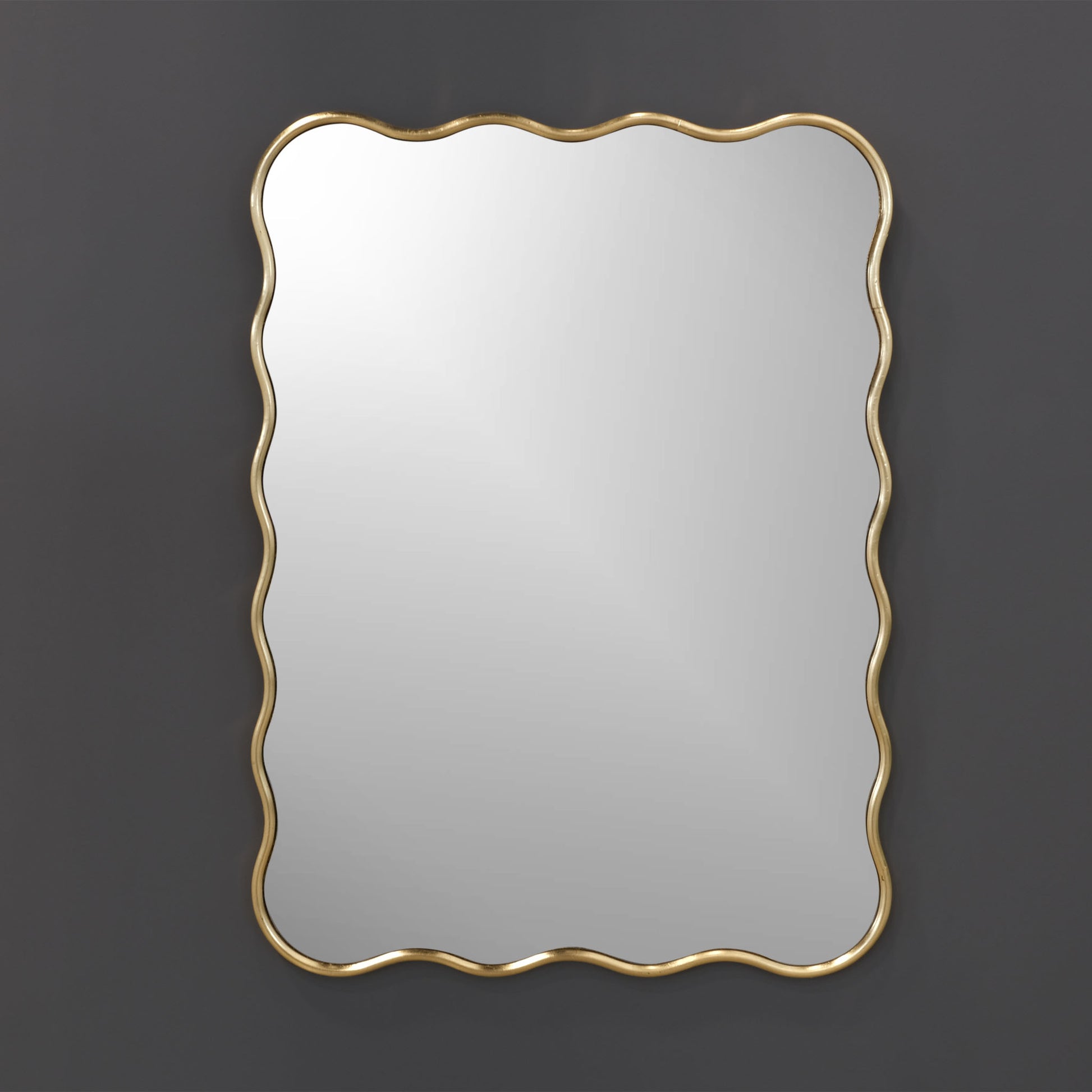 gold mirror on a wall