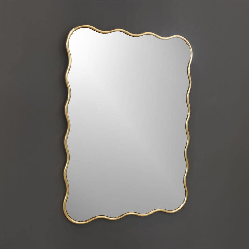 side view of gold curvy mirror