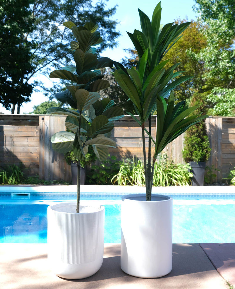 Two white fiberglass planters